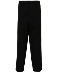 Jil Sander - Broeken ,Zwart ,Wol Zwarte Wollen, Taps Toelopende Broek - Lyst