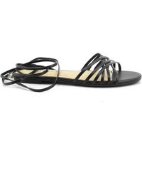 Guess - Flat Sandals - Lyst