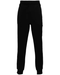 C.P. Company - Pantaloni cargo in felpa nera con diagonale rialzata - Lyst