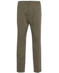 Cruna - Grüne tapered fit hose mitte - Lyst