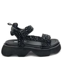 Jeannot - Flat Sandalen - Lyst