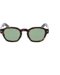 Prada - Accessoires ,Bruin ,Stijlvolle Zonnebril Met Uniek Ontwerp - Lyst