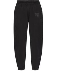Alexander Wang - Broeken ,Zwart ,Zwarte Klassieke Sweatpant Met Puffverf - Lyst