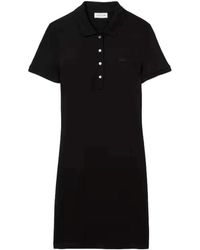 Lacoste - Kleedjes ,Zwart ,Katoen Zwarte Slim Fit Piqué Katoenen Jurk - Lyst