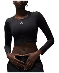 Nike - Fitness ,Zwart ,Katoen Flight Cropped Lange Mouwen T-Shirt - Lyst