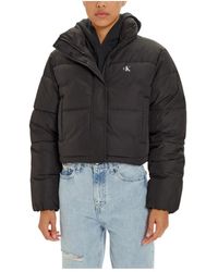 Calvin Klein - Schwarze turtleneck zip-up jacke mit taschen - Lyst