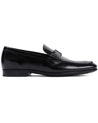 Tod's - Mocassini in pelle nera eleganti scarpe slip-on - Lyst
