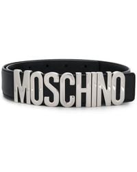 Moschino - Schwarzer ledergürtel mit logo-verschluss - Lyst