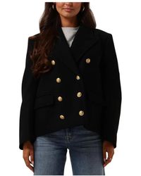 DRYKORN - Jassen ,Zwart ,Wol Elegante Zwarte Jas Ordburgh - Lyst