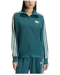 adidas - Fitness ,Blauw ,Polyester Firebird Loose Track Top - Lyst