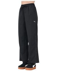 PUMA - Sportliche Lace Woven Schwarze Hose - Lyst