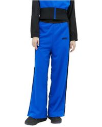 Moncler - Pantalones de chándal con cierres laterales de cremallera y botón a presión y construcción de paneles - Lyst