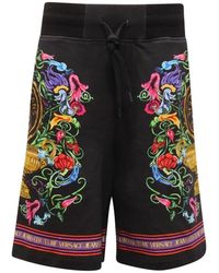 Versace - Korte Broeken ,Zwart ,Panel Garden Bermuda Shorts Couture - Lyst