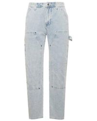 Guess - Jeans Mit Besticktem Logo Und Reißverschluss - Lyst