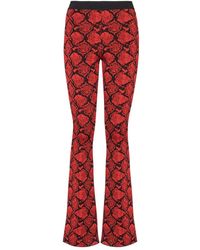 Balmain - Bootcut-hose aus jacquard-strick mit pythonmuster - Lyst