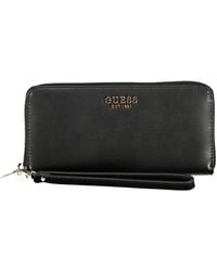 Guess - LAUREL SLG LARGE ZIP AROUND - Lyst