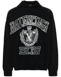 Balenciaga - Schwarzer pullover mit logo-print und distressed-effekt - Lyst