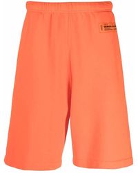 Heron Preston - Korte Broeken ,Oranje ,Katoen Katoenen Logo Sweat Shorts Oranje - Lyst