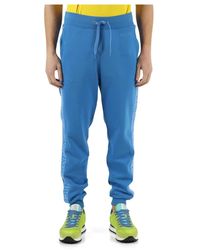 Moschino - Pantalone sportivo in cotone garzato con bande laterali logate - Lyst