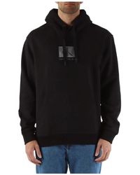 Calvin Klein - Kapuzen-sweatshirt aus baumwolle mit gesticktem logo - Lyst