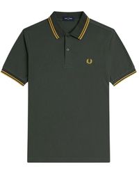 Fred Perry - Tops ,Groen ,Katoen Logo Polo Shirt Groen Katoen Korte Mouw - Lyst