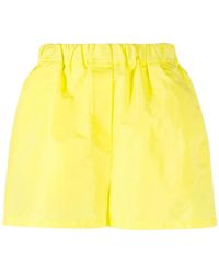 MSGM - Shorts tecnici gialli in taffetà - Lyst