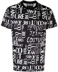 Versace - Magliette in cotone con stampa doodle logo - nero - Lyst