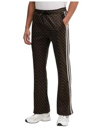 Guess - Broeken ,Bruin ,Polyester Parimo Trainingsbroeken - Lyst
