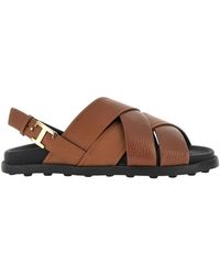 Tod's - Flat sandals - Lyst