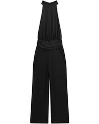 Guess - Jumpsuits & Playsuits ,Zwart ,Leer Halter-Neck Jumpsuit - Lyst