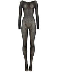 Wolford - Jumpsuits - Lyst