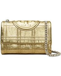 Tory Burch - Borsa a tracolla in pelle dorata con monogramma - Lyst