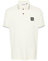 Stone Island - Polo a righe con patch compass - Lyst