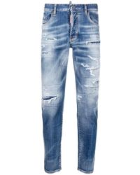 DSquared² - Blaue slim-fit ripped jeans mit distressed-effekt - Lyst