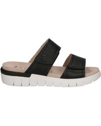 Caprice - Schoenen ,Zwart ,Leer Zwarte Casual Open Platte Sandalen - Lyst