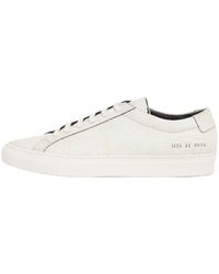 Common Projects - Gebrochene weiße sneakers - Lyst