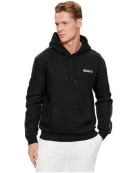 Guess - Hoodies & Sweatvesten ,Zwart ,Katoen Zwart Katoenen Sweatshirt - Lyst