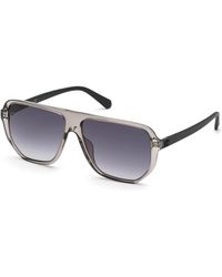 Guess - Stilvolle schwarze sonnenbrille mit grauen gläsern,goldenes gradient rauch sonnenbrille - Lyst