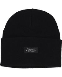 DOLLY NOIRE - Schwarze Elastische Beanie Mütze - Lyst