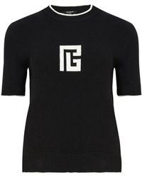 Balmain - Truien & Vesten ,Zwart ,Katoen Gebreide Trui Met Logo - Lyst