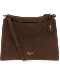 Alaïa - Cross Body Bags - Lyst