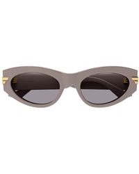Bottega Veneta - Gafas de sol ovaladas con rayas metálicas - Lyst