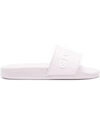 Givenchy - Geprägtes logo slide flache sandalen - Lyst