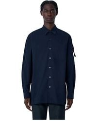Dries Van Noten - Overhemden ,Blauw ,Katoen Katoenen Poplin Button-Down Overhemd - Lyst