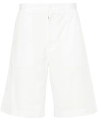 Dolce & Gabbana - Bermuda shorts bianchi con logo plaque - Lyst