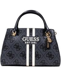 Guess - Handbags - Lyst