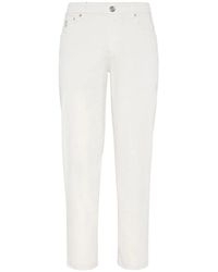 Brunello Cucinelli - Weiße slim-fit jeans mit gesticktem logo - Lyst