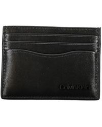 Calvin Klein - Accessoires ,Zwart ,Leer Zwarte Leren Portemonnee - Lyst