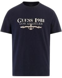 Guess - T-shirt in tessuto blu - Lyst