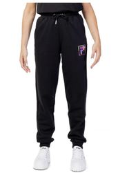 Fila - Women& trousers - Lyst